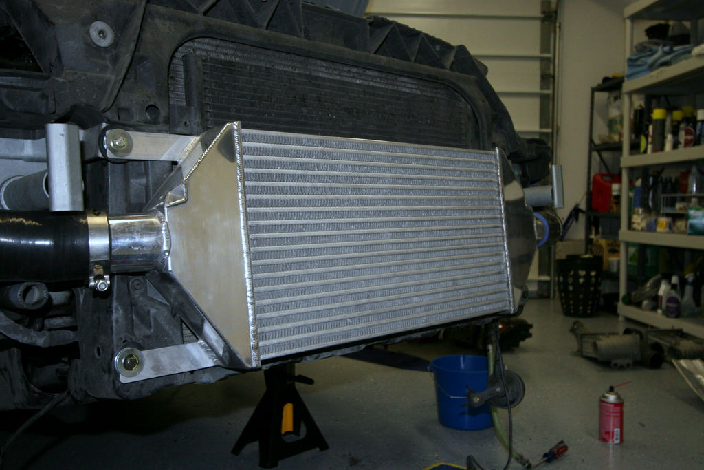 Anyone add a front mount intercooler to the dual side mounts on an MK1